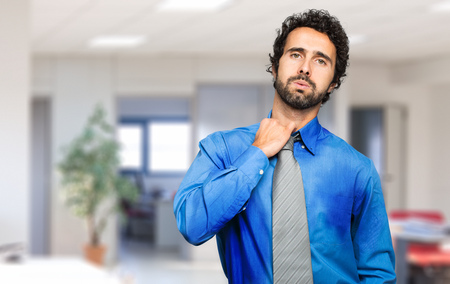 sweating businessman