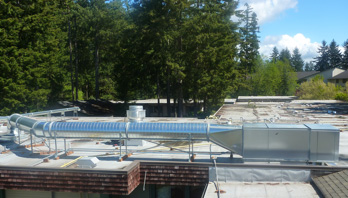 Commercial kitchen evaporative make-up air installation at an Olympia healthcare facility.